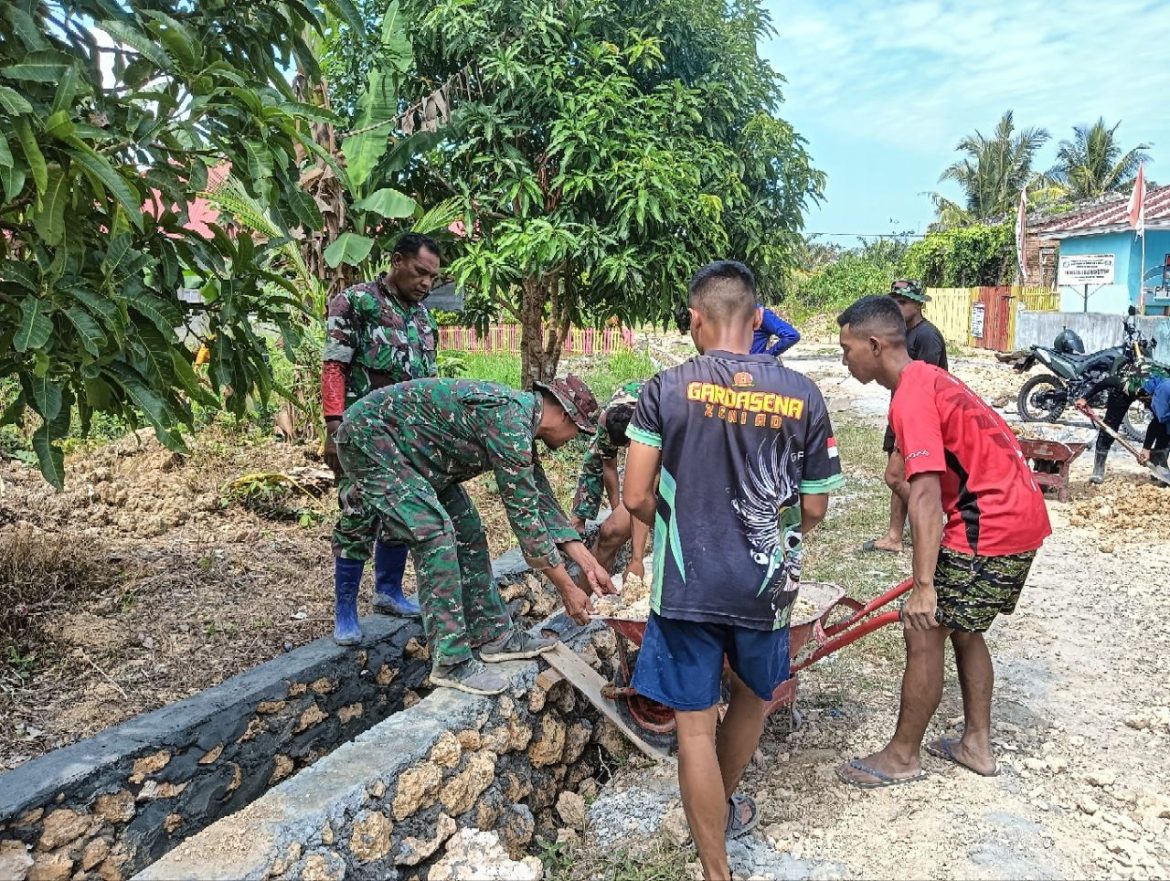 Satgas TMMD Ke 118 Kodim 1427/Pasangkayu Laksanakan Penimbunan Badan Jalan Drinase